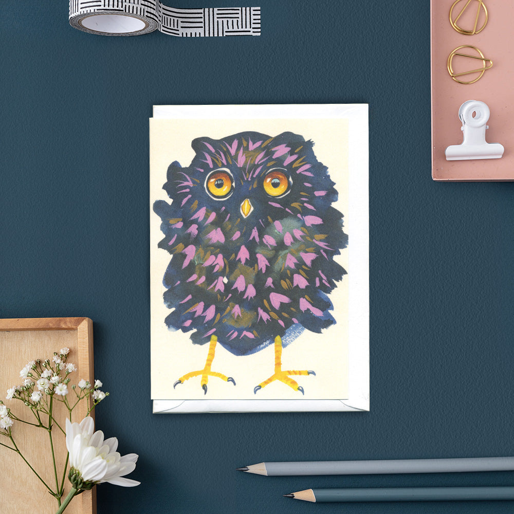 Greetings card Colorful owl illustration on with pencils and stationery