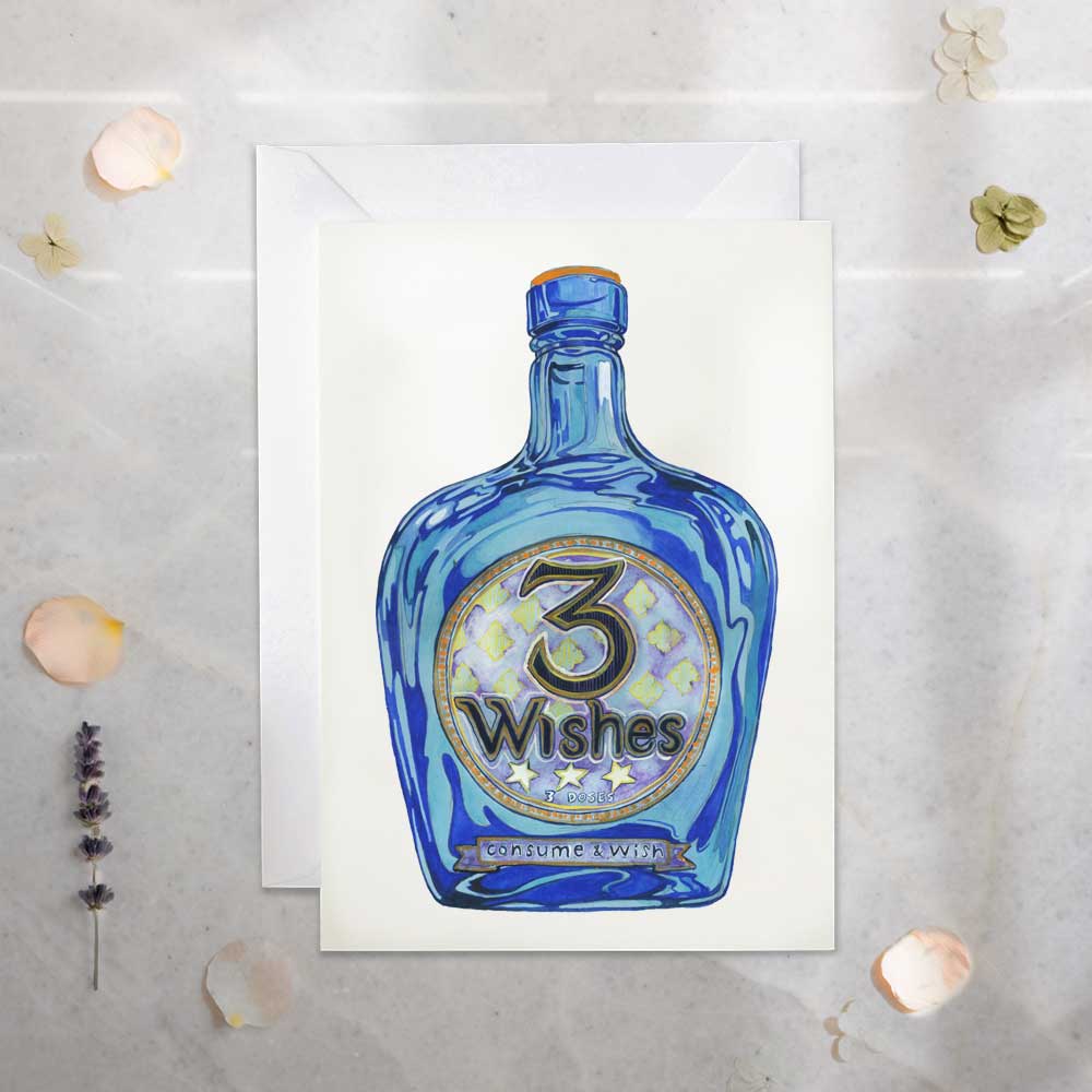 Card with a blue bottle labeled '3 Wishes' on a textured surface.