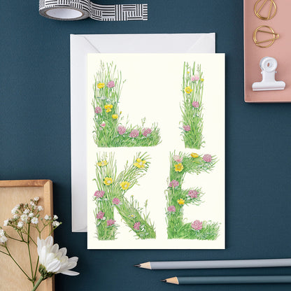 Like - letters made out of meadow grass - Greetings Card