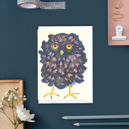 Greetings card Colorful owl illustration on with pencils and stationery 