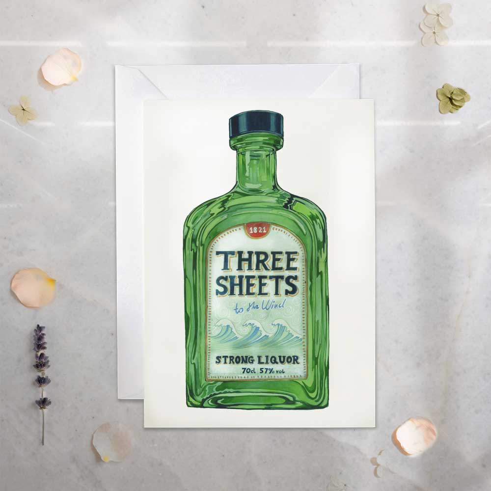greetinsg Card with a green liquor bottle illustration labeled 'Three Sheets' on a textured surface.