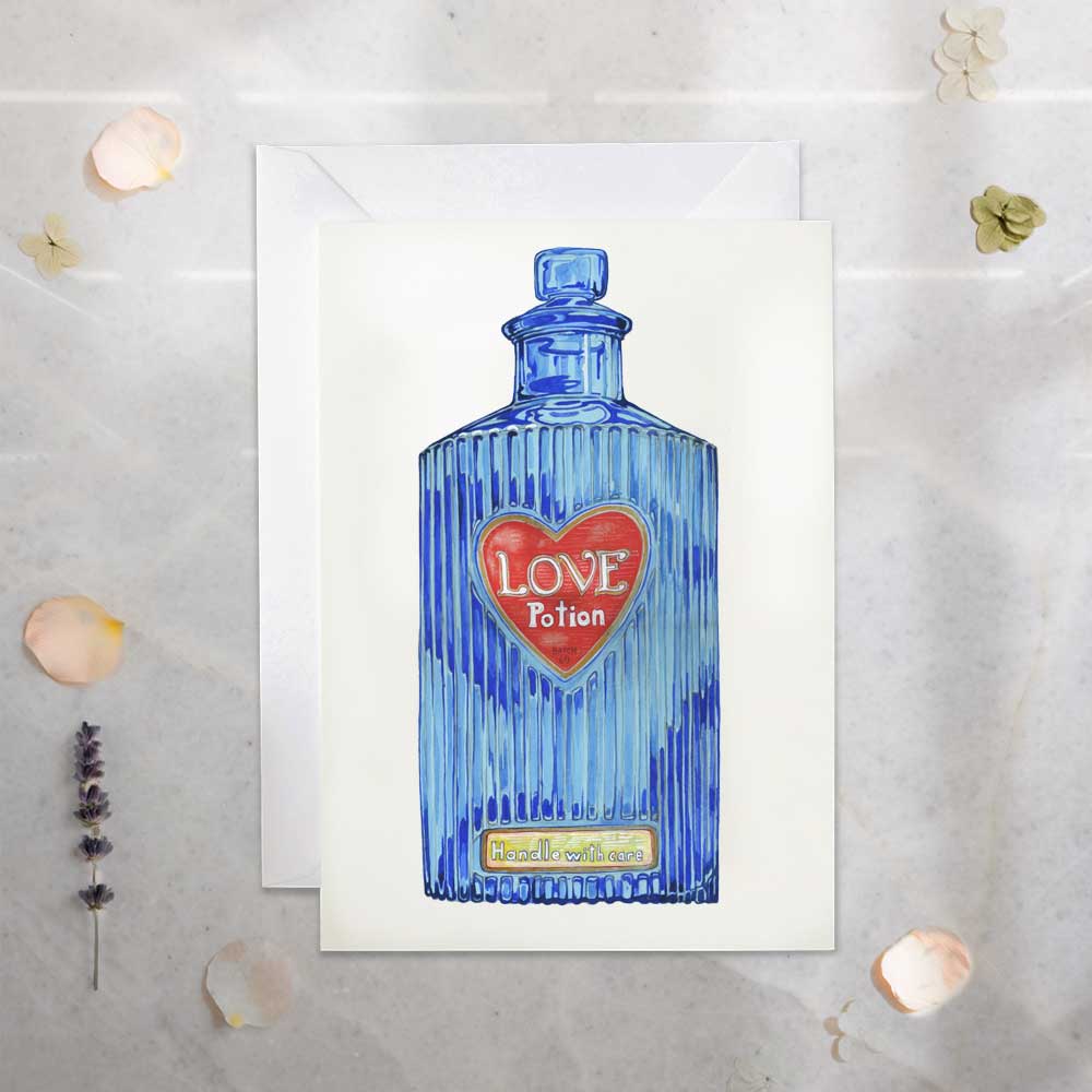 valentines day greetings card Blue potion bottle with a red heart label on a white card, set against a light gray background.