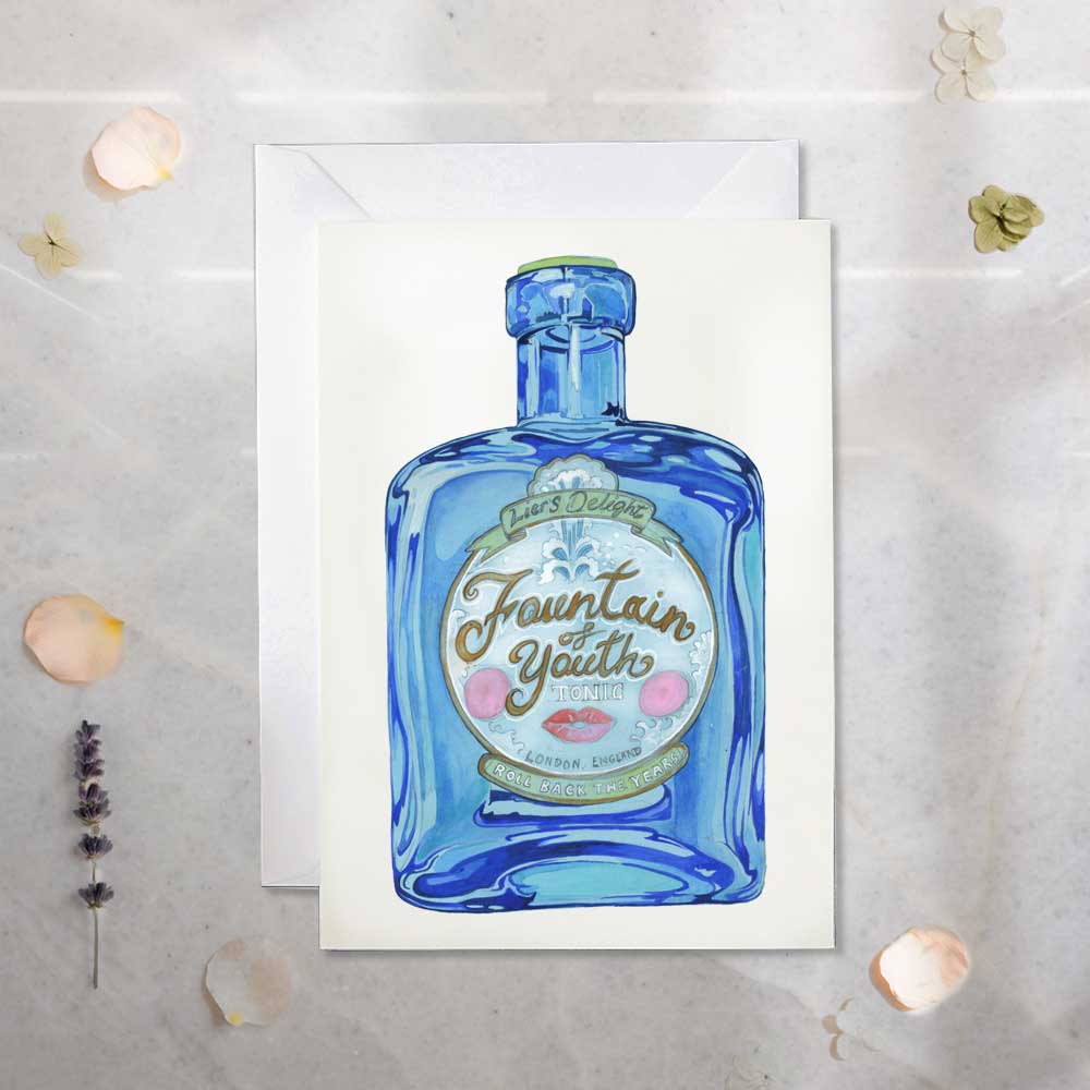 Greeting card Fountain of youth - Tonic Blue bottle design on a textured surface.