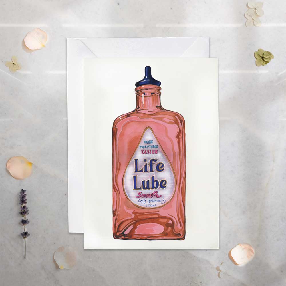 Illustration of a Life Lube bottle on a textured surface with decorative elements.