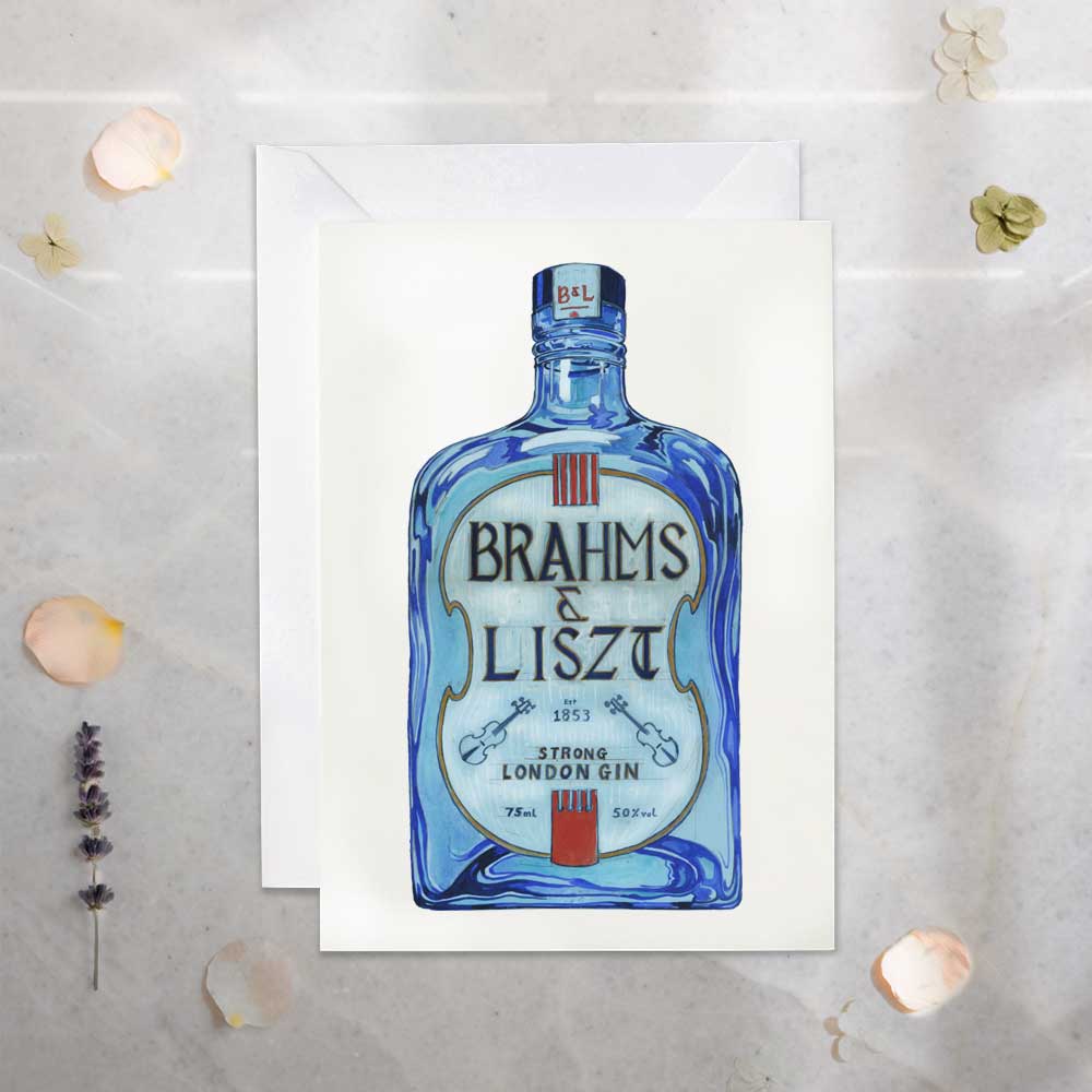 Brahms & Liszt gin bottle on a white card with decorative elements on a light gray background