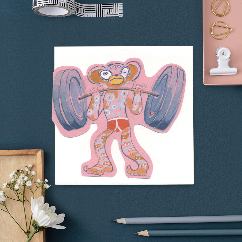 Monkey lifting weights  die cut greetings card