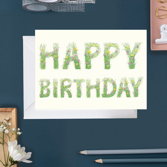 Happy Birthday - letters made out of meadow grass - Greetings Card